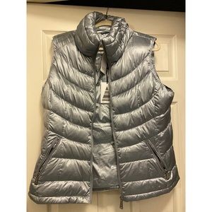 Puffy metallic grey vest. Never worn